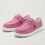Mocassins femme en toile ultra-légers coloris rose, vue de face sur fond studio